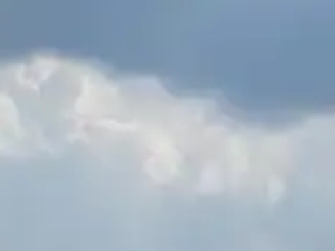 The same cloud detail from the WebP at quality 0.5.